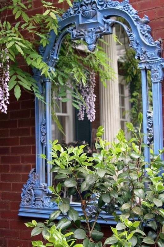 repurposing an old mirror in the garden