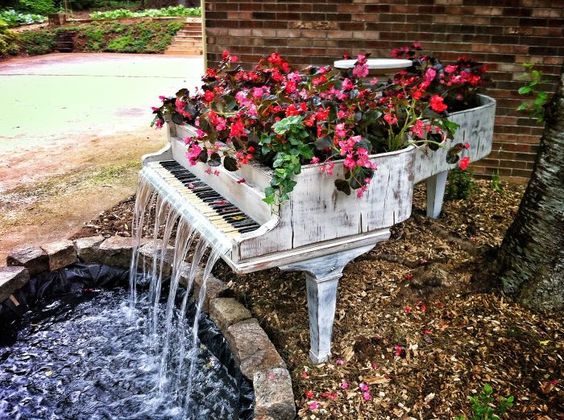 a creative planter using an old piano