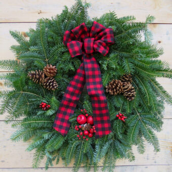 bearcamp wreath on natural wood background