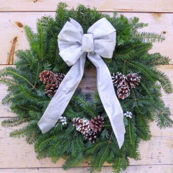 white water wreath on natural wood background